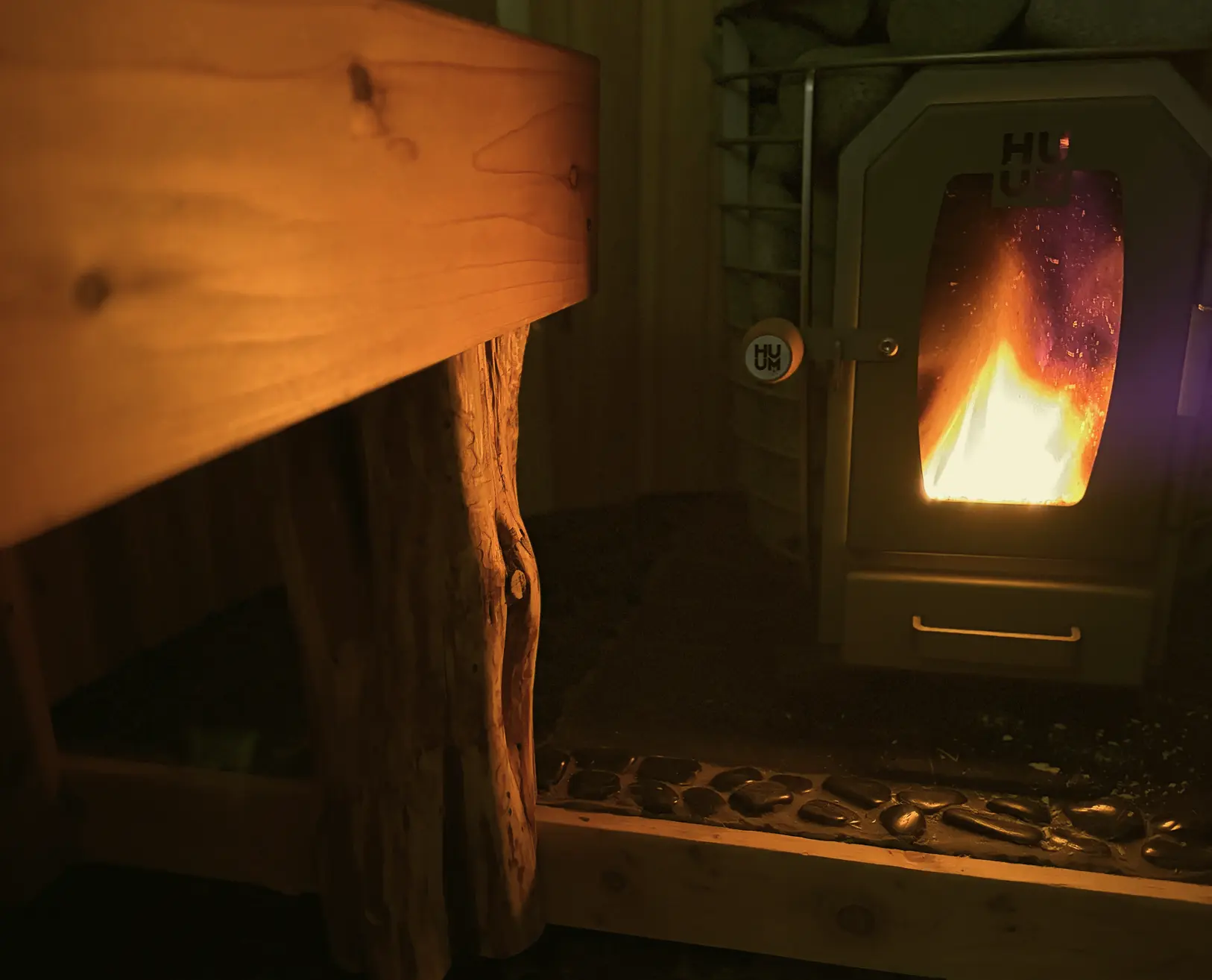 Wood-burning stove inside the rental sauna